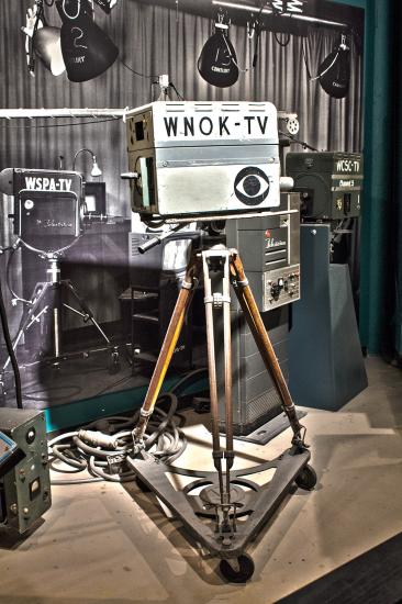 Vintage television camera with WNOK-TV written on the side with the CBS 'eye' logo