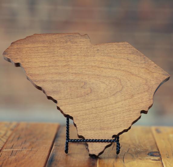 Dark Wooden Cutting Board in SC State Shape