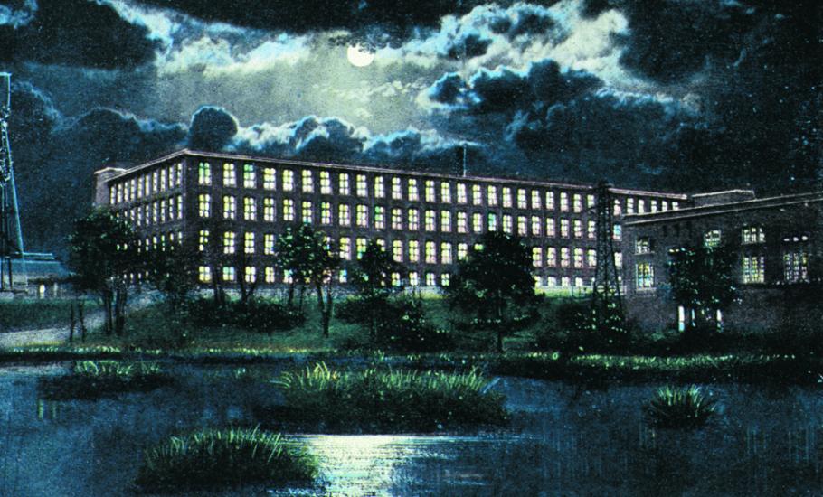 Colorful illustration of a large rectangular four story building with large windows and the Columbia Canal in the foreground